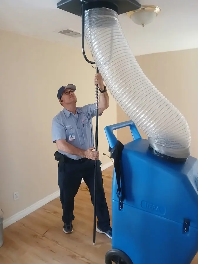 HVAC Installation technician using HEPA equipment in Westwood